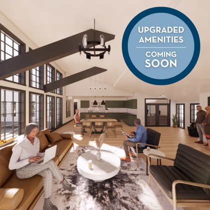 A modern lounge with people and a sign announcing 'upgraded amenities coming soon'.